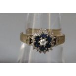 9ct gold blue and white stone cluster ring. 2.7g approx. Size M. (B.P. 21% + VAT)