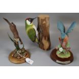Three animal figures; Country Artists 'otters swimming', Kingfisher by Leonardo with wooden base and