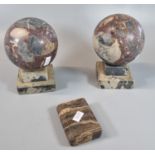 Pair of Grand Tour architectural marble sculptures, ball on plinth together with a marble