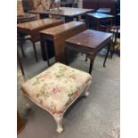 19th century mahogany drop leaf table on baluster ring turned legs and casters together with a
