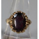 9ct gold and faceted red stone dress ring. 4.5g approx. Size N 1/2. (B.P. 21% + VAT)