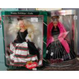 Barbie Happy Holidays Gala doll together with another Happy Holidays Barbie doll, both in original