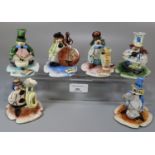 A collection of Italian Zampiva hand made pottery musical clown figures with various instruments. (