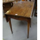 19th century mahogany Pembroke table on square tapering legs, spade feet and casters. (B.P. 21% +