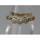 18ct gold diamond three stone ring. 2.4g approx. Size J. (B.P. 21% + VAT)