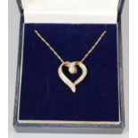 9ct gold fine necklace with 9ct gold heart pendant. 2.5g approx. (B.P. 21% + VAT)
