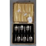 Set of six silver cased tea spoons, Birmingham hallmarks. 2.38 troy oz. approx. (B.P. 21% + VAT)