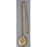 9ct gold chain with oval flowerhead locket. 10.8g approx. (B.P. 21% + VAT)