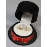 Novelty ring box in the form of a top hat the interior revealing a 9ct gold white stone cluster