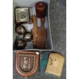 Box of assorted items to include: butter pats, leather bookends, leather lidded pot with fleur de