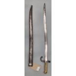 French 1868 pattern probably WWI period sword bayonet with brass hilt and steel scabbard. Overall