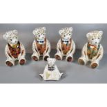 Four Royal Crown Derby seated teddy bears with dicky bows, all in original boxes together with a
