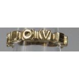 9ct gold ring marked 'Love God'. Size K. 4.3g approx. (B.P. 21% + VAT)