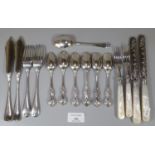 Collection of silver flatware, some with mother of pearl handles. Total weight not including