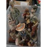 Box containing three Capodimonte figures and one similar continental porcelain figure to include: