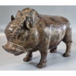 Chinese Han style model of a boar in yellow metal. 17cm high approx. at the shoulder, length 26cm