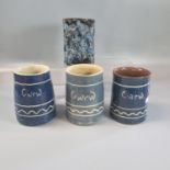 Three Ewenny pottery slip glazed 'Cwrw' jugs, all marked 'Clay Pits Ewenny', together with another
