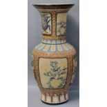 Large oriental design pottery floor vase decorated with vignettes of flowers and foliage, bamboo