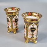 A pair of Royal Crown Derby English bone china 1128 miniature cylinder Imari vases. (B.P. 21% + VAT)