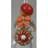 Two 9ct gold and coral dress rings together with another yellow metal dress ring. 10g approx. (3) (