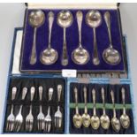 Cased set of six cake forks. 2.45 troy oz approx. Together with a cased set of six silver Apostle