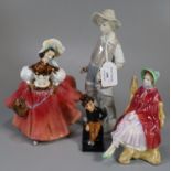 Three Royal Doulton bone china figurines to include: 'Jingle', 'Sally HN2741', 'The Skater HN2117'