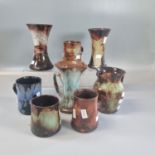 Collection of Ewenny pottery items to include: vases, jugs and mugs. (8) (B.P. 21% + VAT)