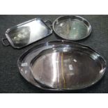 Collection of silver plate to include: two handled and other trays. (4) (B.P. 21% + VAT)