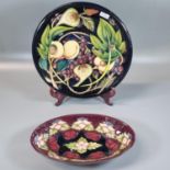 Modern Moorcroft pottery tube lined 'Morello' cherry pattern oval dish, dated 1995. 23cm long