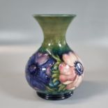 Mid Century Moorcroft pottery tube lined 'Anemone' green ground baluster vase. 13cm high approx,