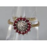 18ct gold, diamond and garnet ring. Size M. 3.2g approx.