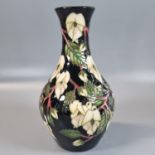 Modern Moorcroft pottery tube lined 'Perfect Harmony' design baluster vase. 21cm high approx,