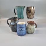 Collection of Ewenny pottery items, mainly jugs and one vase, some marked 'Clay Pits' to the