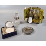 A velvet cased scent bottle set comprising two glass bottles and stoppers, a cut glass cruet