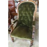 Victorian mahogany button back upholstered fireside open armchair on baluster turned legs and