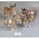 Collection of four Beswick donkeys, two of them foals. (4) (B.P. 21% + VAT)