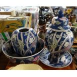 Modern Chinese blue ground exotic bird design china to include: two large ginger jars (one without