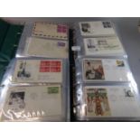 USA collection of First Day Covers and few cards in four green albums. About 600 covers, 1940-2005