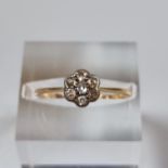 18ct gold and diamond flowerhead cluster ring. 1.7g approx. Size L. (B.P. 21% + VAT)