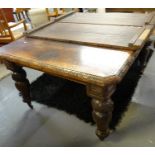 Late Victorian carved oak extending dining table with two additional leaves. (B.P. 21% + VAT)