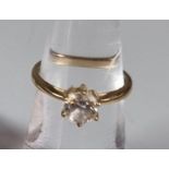 9ct gold solitaire design white stone ring. 2.1g approx. Size K. (B.P. 21% + VAT)