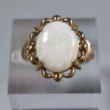 Yellow metal and opal dress ring. 3.9g approx. Size L. (B.P. 21% + VAT)