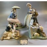Collection of three Nao Spanish porcelain figures of young girls with animals and parasols, together