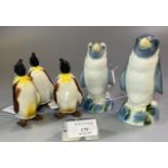 Set of three Beswick china penguins, together with two other similar porcelain penguins. (5) (B.P.