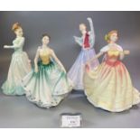 Four Royal Doulton bone china figurines to include: In Vogue 'Joanne', 'Cynthia', 'Deborah' and '