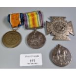 Two 1914-1918 WWI medals, one with ribbon, the rim marked 'G 9230 PTE C Hill E. Kent. R', the