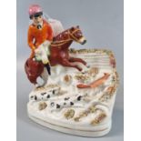 Late 19th Century Staffordshire pottery fox hunting figure group. (B.P. 21% + VAT)