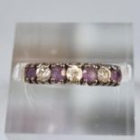 9ct gold purple and white stone dress ring. 1.7g approx. Size M. (B.P. 21% + VAT)