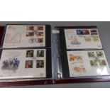 Great Britain collection of Stuart First Day Covers in Royal Mail Album. 1984 to 1993 period all