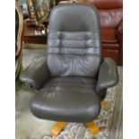 Modern leather swivel armchair on a beech frame. (B.P. 21% + VAT)